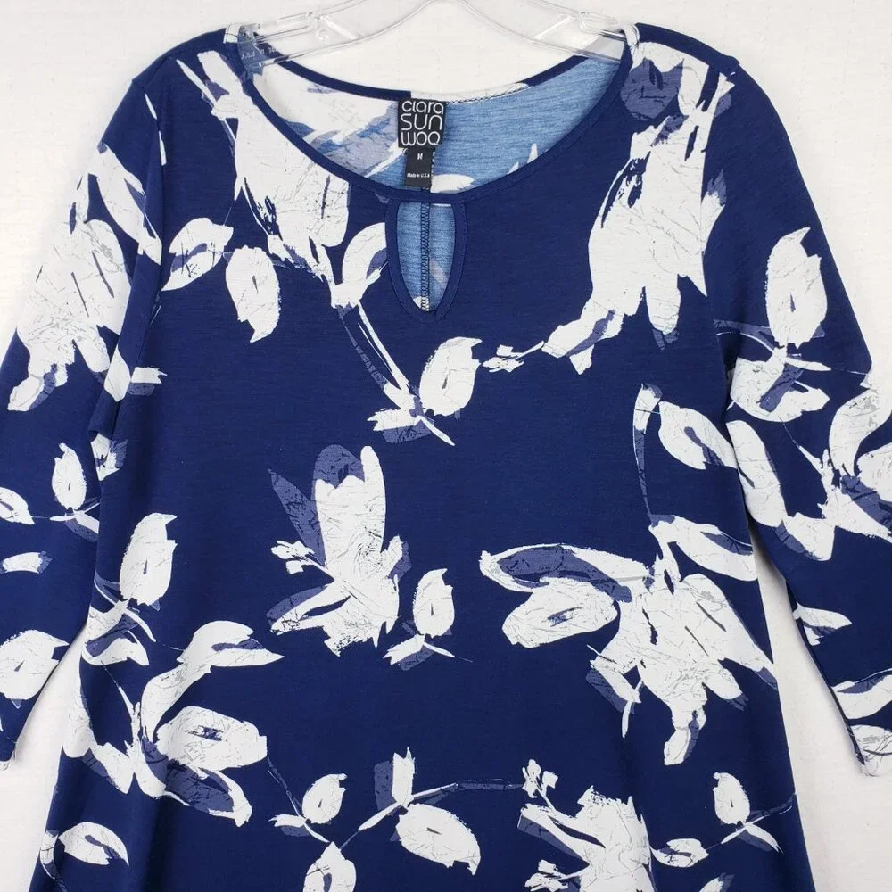 Clara Sun Woo USA Tunic Top Stretch Floral Print Sharkbite Hem size M Relaxed